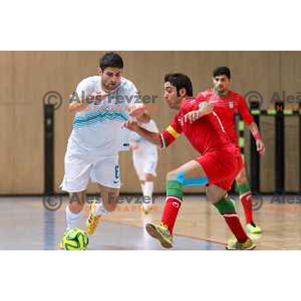 Uros Kroflic of Slovenia vs Taheri Mohammad of Iran during friendly Futsal match between Slovenia and Iran, played in Kidricevo, Slovenia on February 10, 2015