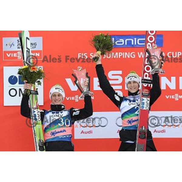 Peter Prevc (SLO)runner-up and winner Jurij Tepes (SLO) of Ski flying competition during the Final of FIS Ski jumping World Cup in Planica, Slovenia on March 22, 2015