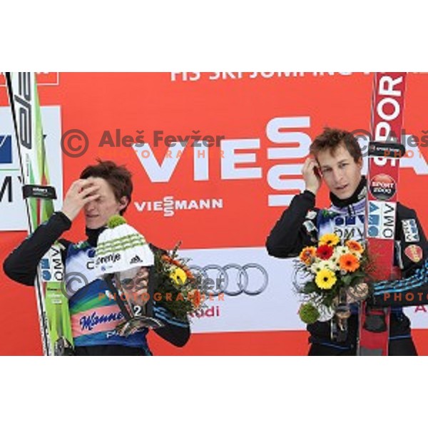 Peter Prevc (SLO) runner-up and winner Jurij Tepes (SLO) of Ski flying competition during the Final of FIS Ski jumping World Cup in Planica, Slovenia on March 22, 2015