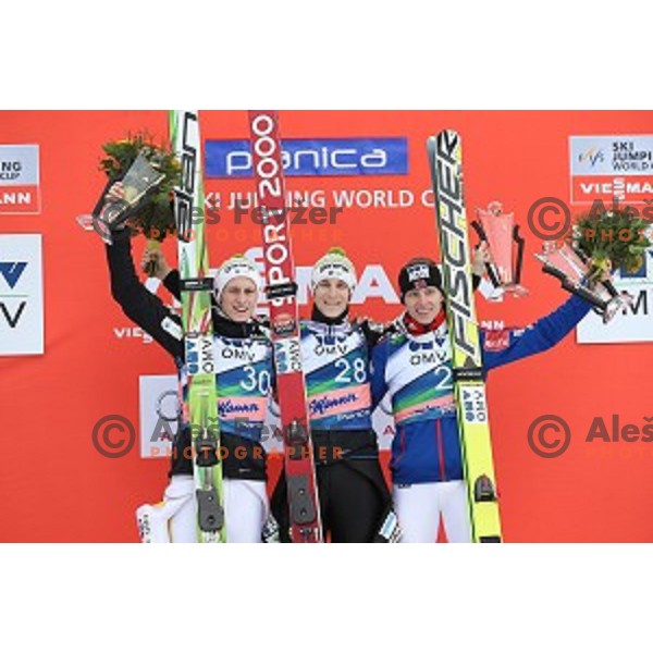 Peter Prevc (SLO)runner-up, winner Jurij Tepes (SLO)and Stefan Kraft (AUT third placed at Ski flying competition during the Final of FIS Ski jumping World Cup in Planica, Slovenia on March 22, 2015
