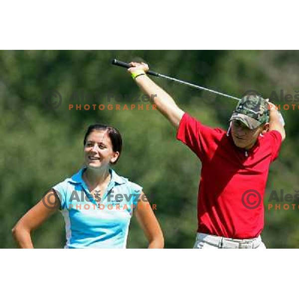 Zala Pia Jenko and Martin Stanic at Castrol golf tournament played on Kings Golf course at Bled 2.8.2007. Photo by Ales Fevzer 