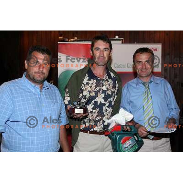 Gorazd Kranjc with trophy for longest drive (288 meters) at Castrol golf tournament played on Kings Golf course at Bled 2.8.2007. Photo by Ales Fevzer 