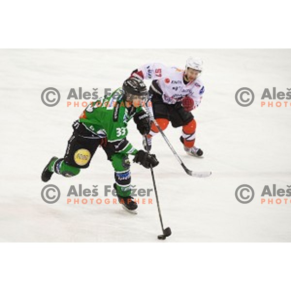 Jure Sotlar of Telemach Olimpiaj in action during ice hockey match of Slovenian National League Final in Season 2014/15 between HDD Telemach Olimpija and HDD SIJ Acroni Jesenice, played in Tivoli Hall, Ljubljana, Slovenia, on April 9th, 2015