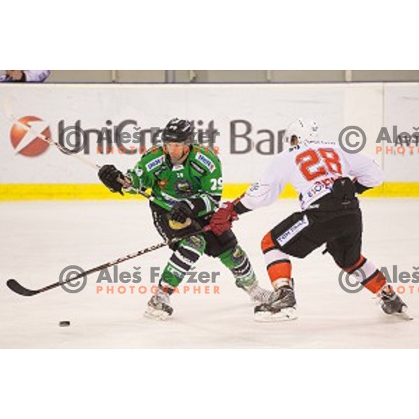Anze Ropret of Telemach Olimpiaj in action during ice hockey match of Slovenian National League Final in Season 2014/15 between HDD Telemach Olimpija and HDD SIJ Acroni Jesenice, played in Tivoli Hall, Ljubljana, Slovenia, on April 9th, 2015