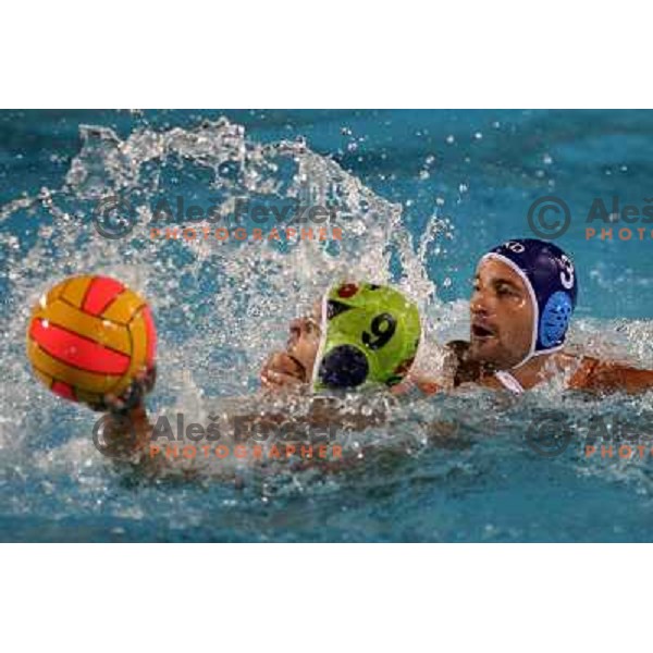 Ivan Vuksanovic (3) fouls Erik Bukovac (9) at match Slovenia- Macedonia in Tristar waterpolo tournament in Kranj Slovenia. Photo by Ales Fevzer 