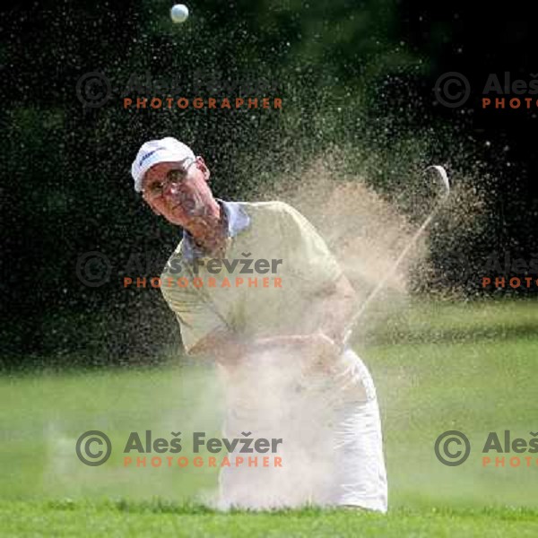Marjan Urh of Slovenia playing out of a bunker at 12th hole during European Senior Team Championship, played at Kings golf course at Bled, Slovenia 18.8.2007.Photo by Ales Fevzer 
