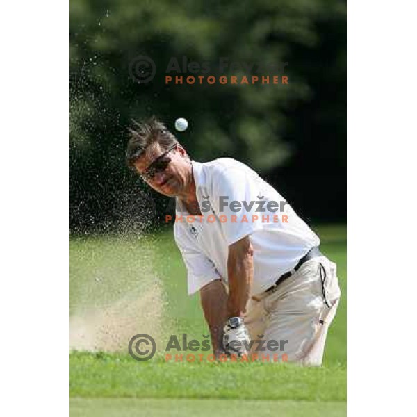 Veijo Suomela of Finland playing out the bunker on 11th hole at European Senior Team Championship, played at Kings golf course at Bled, Slovenia 18.8.2007.Photo by Ales Fevzer 