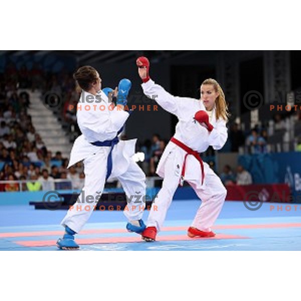 Tjasa Ristic (SLO) competes against Coban (TUR) in semi-final of Karate Women\'s Kumite -61 kg at First European Games in Crystal Hall 3 in Baku, Azerbaijan on June 13, 2015