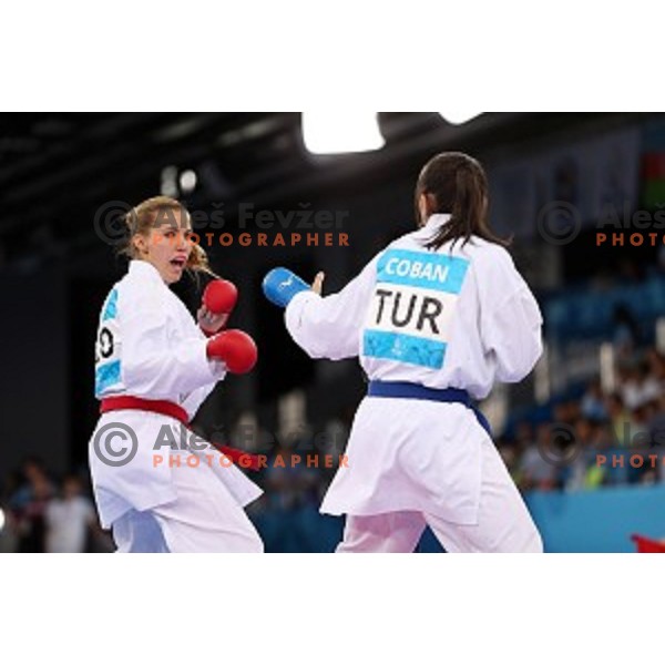 Tjasa Ristic (SLO) competes against Coban (TUR) in semi-final of Karate Women\'s Kumite -61 kg at First European Games in Crystal Hall 3 in Baku, Azerbaijan on June 13, 2015