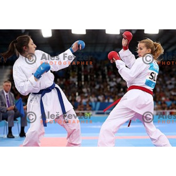 Tjasa Ristic (SLO) competes against Coban (TUR) in semi-final of Karate Women\'s Kumite -61 kg at First European Games in Crystal Hall 3 in Baku, Azerbaijan on June 13, 2015