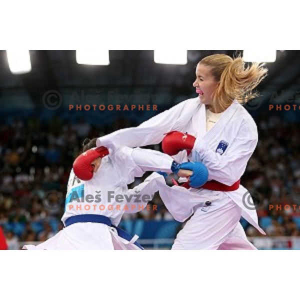 Tjasa Ristic (SLO) competes against Coban (TUR) in semi-final of Karate Women\'s Kumite -61 kg at First European Games in Crystal Hall 3 in Baku, Azerbaijan on June 13, 2015