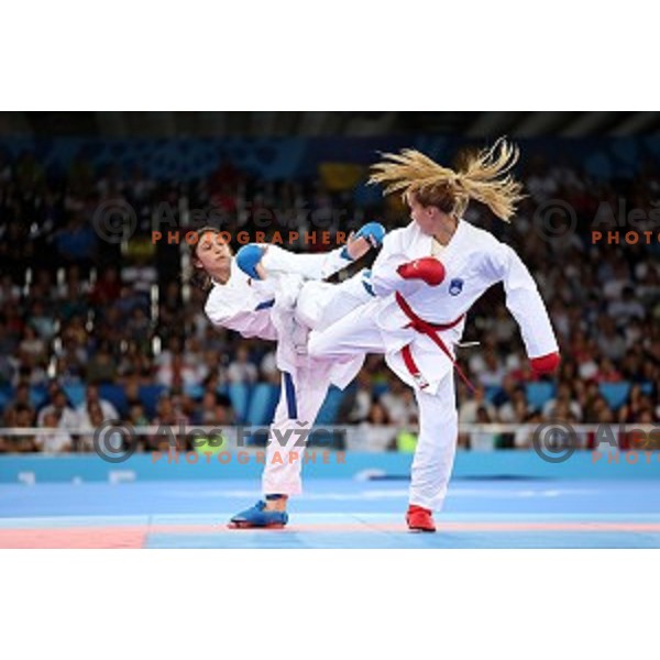 Tjasa Ristic (SLO) competes against Coban (TUR) in semi-final of Karate Women\'s Kumite -61 kg at First European Games in Crystal Hall 3 in Baku, Azerbaijan on June 13, 2015