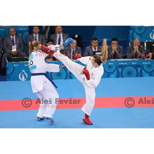 Tjasa Ristic (SLO) competes against Ana Lenard (CRO) in bronze medal match in Karate Women\'s Kumite -61 kg at First European Games in Crystal Hall 3 in Baku, Azerbaijan on June 13, 2015