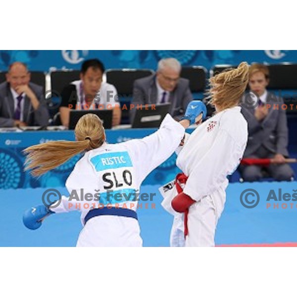 Tjasa Ristic (SLO) competes against Ana Lenard (CRO) in bronze medal match in Karate Women\'s Kumite -61 kg at First European Games in Crystal Hall 3 in Baku, Azerbaijan on June 13, 2015