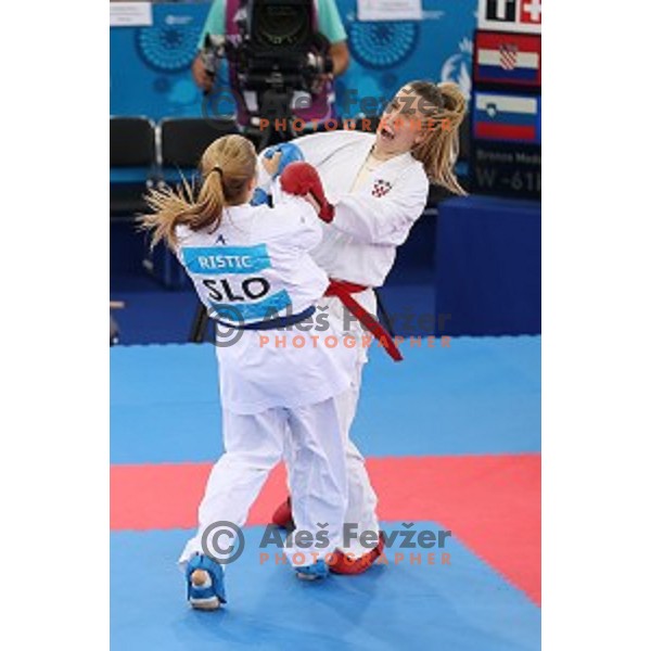 Tjasa Ristic (SLO) competes against Ana Lenard (CRO) in bronze medal match in Karate Women\'s Kumite -61 kg at First European Games in Crystal Hall 3 in Baku, Azerbaijan on June 13, 2015