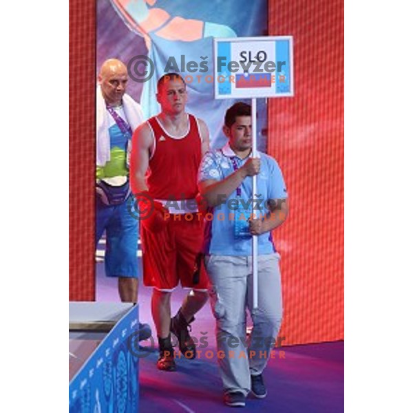 Denis Lazar (red) of Slovenia fights in first round of Box tournament in Crystal Hall during First European Games Baku 2015, Azerbaijan on June 18, 2015