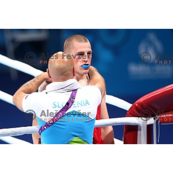 Denis Lazar (red) of Slovenia fights in first round of Box tournament in Crystal Hall during First European Games Baku 2015, Azerbaijan on June 18, 2015