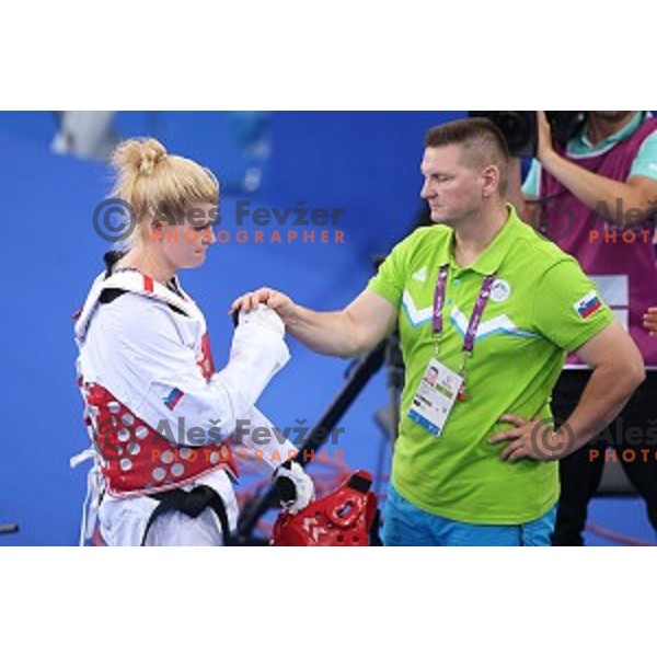 Nusa Rajher of Slovenia , coach Miodrag Krnetic after first round of Taekwondo Women +67 kg in Crystal Hall during Baku 2015 First European Games, Azerbaijan on June 19, 2015