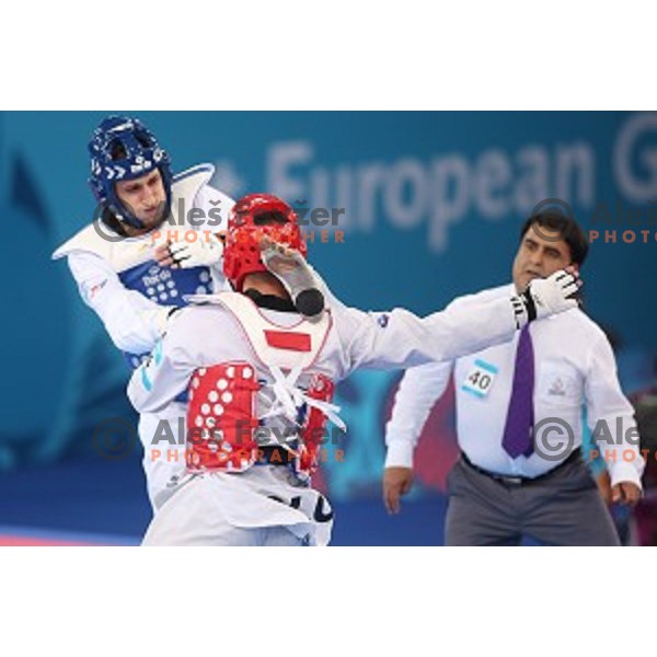 Radik Isaev (AZE) fights with Ivan Trajkovic (SLO) in semi-final of Taekwondo Men +80 kg in Crystal Hall during Baku 2015 First European Games, Azerbaijan on June 19, 2015