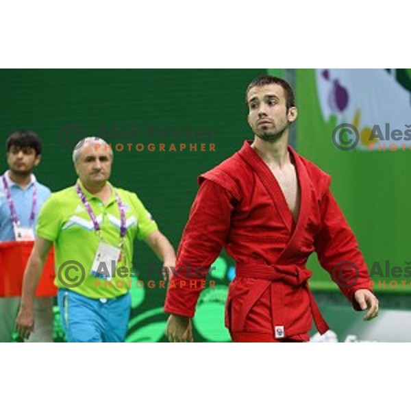 Tadej Cutuk (SLO, red) fights with Kakha Mamulashvili (GEO,blue) in eight-finals of Sambo Men\'s - 74 kg at First European Games Baku 2015 in Heydar Aliyev Arena in Baku, Azerbaijan on June 22, 2015