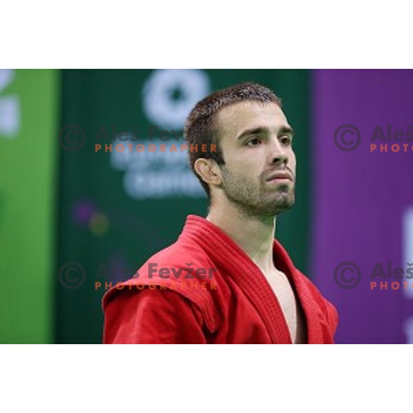 Tadej Cutuk (SLO, red) fights with Kakha Mamulashvili (GEO,blue) in eight-finals of Sambo Men\'s - 74 kg at First European Games Baku 2015 in Heydar Aliyev Arena in Baku, Azerbaijan on June 22, 2015
