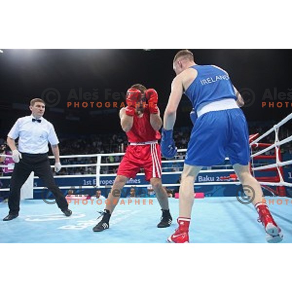 Aljaz Venko (red trunks) of Slovenia fights Michael O\'Rielly (blue trunks) in quarterfinals of Boxing tournament in Crystal Hall during First European Games Baku 2015, Azerbaijan on June 24, 2015