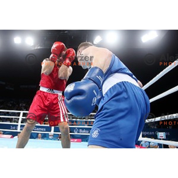 Aljaz Venko (red trunks) of Slovenia fights Michael O\'Rielly (blue trunks) in quarterfinals of Boxing tournament in Crystal Hall during First European Games Baku 2015, Azerbaijan on June 24, 2015