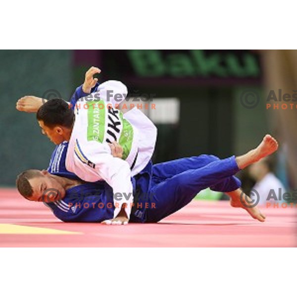 Adrian Gomboc of Slovenia fights in Men\'s -66 kg at Judo Tournament in Heydar Aliyev Arena at First European Games Baku 2015 in European Games Park, Azerbaijan on June 25, 2015