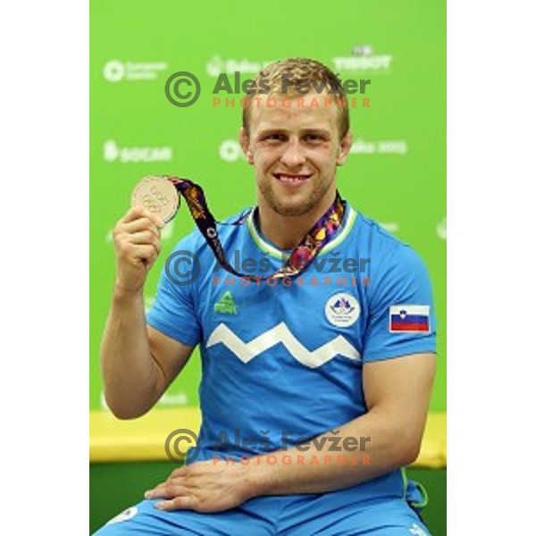 Rok Draksic of Slovenia, winner of bronze medal in Men\'s -73 kg at Judo Tournament in Heydar Aliyev Arena at First European Games Baku 2015 in European Games Park, Azerbaijan on June 26, 2015