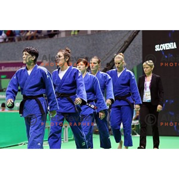 Coach Urska Zolnir, Anamarija Velensek,Anka Pogacnik, Tina Trstenjak, Vlora Bedeti, Petra Nareks of Slovenia, winners of Bronze Medal at Judo Team event in Heydar Aliyev Arena at First European Games Baku 2015 in European Games Park, Azerbaijan on June 28, 2015