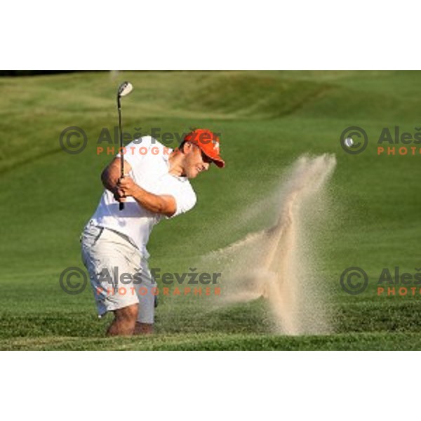 Jure Kosir playing out of bunker during golf tournament at Diners golf course, Smlednik ,Slovenia on September 15, 2009