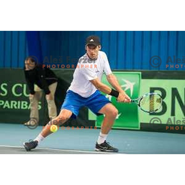 Grega Zemlja of Slovenia in action during Davis Cup match between Slovenia and Lithuania in Kranj, Slovenia on October 30, 2015.