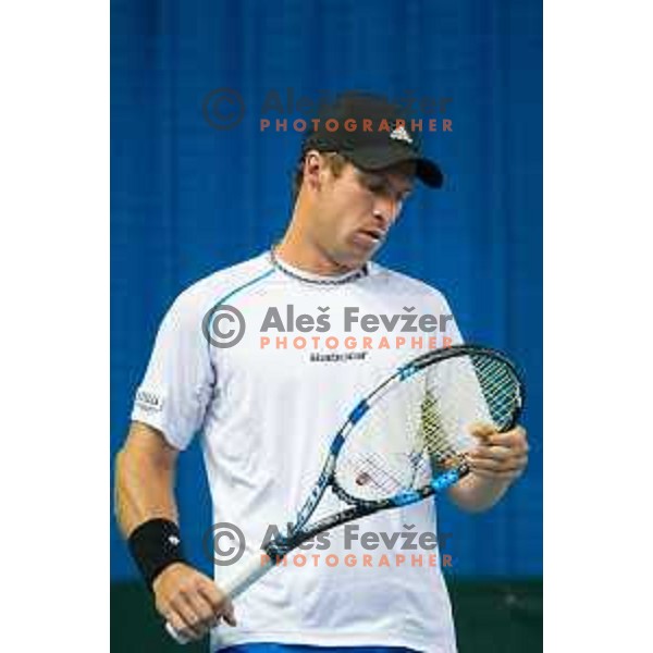 Grega Zemlja of Slovenia in action during Davis Cup match between Slovenia and Lithuania in Kranj, Slovenia on October 30, 2015.