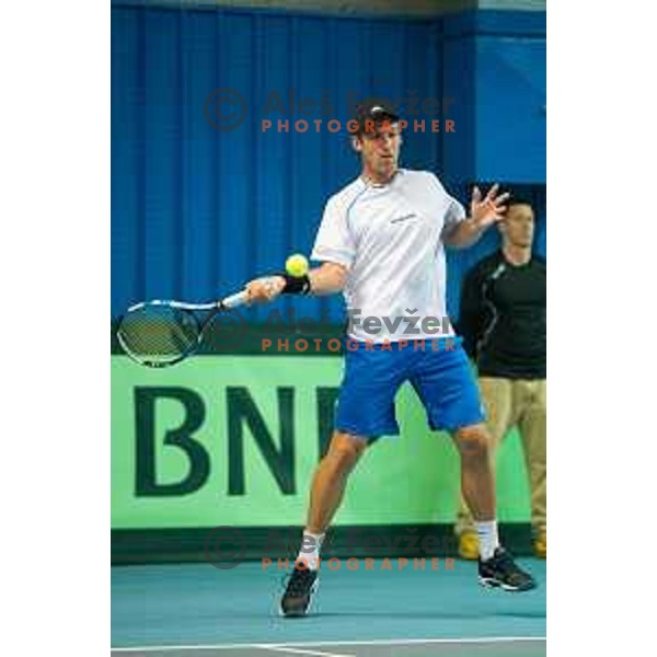 Grega Zemlja of Slovenia in action during Davis Cup match between Slovenia and Lithuania in Kranj, Slovenia on October 30, 2015.