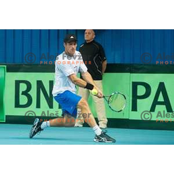 Grega Zemlja of Slovenia in action during Davis Cup match between Slovenia and Lithuania in Kranj, Slovenia on October 30, 2015.