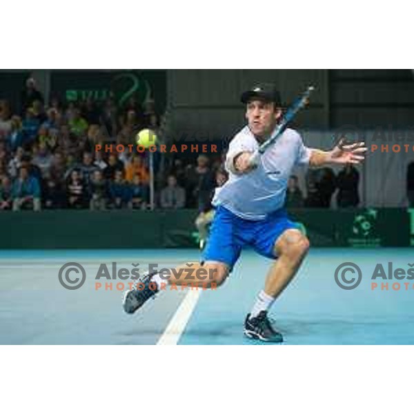 Grega Zemlja of Slovenia in action during Davis Cup match between Slovenia and Lithuania in Kranj, Slovenia on October 30, 2015.