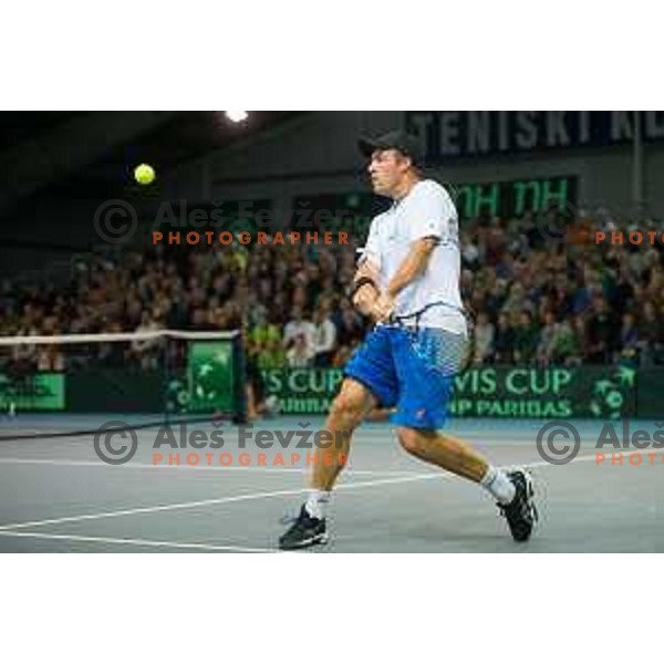 Grega Zemlja of Slovenia in action during Davis Cup match between Slovenia and Lithuania in Kranj, Slovenia on October 30, 2015.