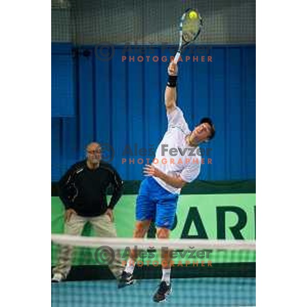 Grega Zemlja of Slovenia in action during Davis Cup match between Slovenia and Lithuania in Kranj, Slovenia on October 30, 2015.