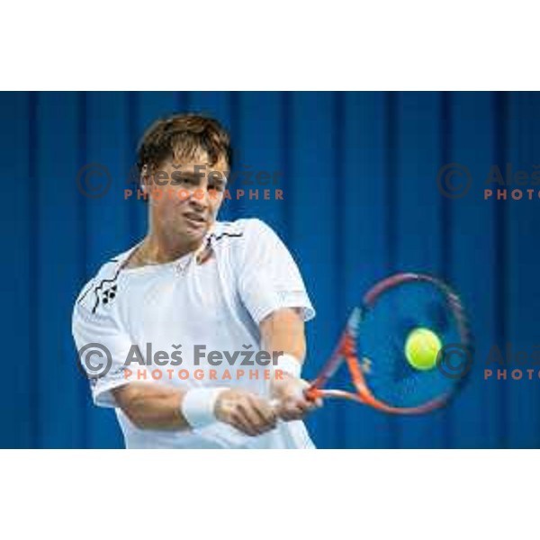 Ricardas Berankkis of Lithuania in action during Davis Cup match between Slovenia and Lithuania in Kranj, Slovenia on October 30, 2015.