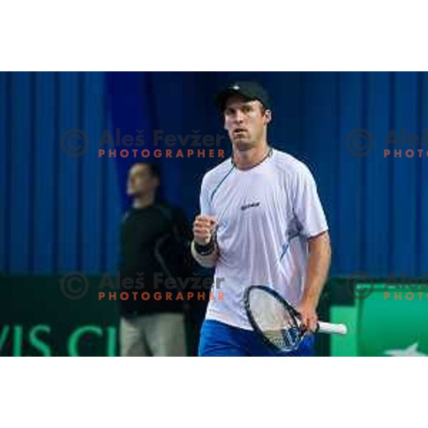 Grega Zemlja of Slovenia in action during Davis Cup match between Slovenia and Lithuania in Kranj, Slovenia on October 30, 2015.