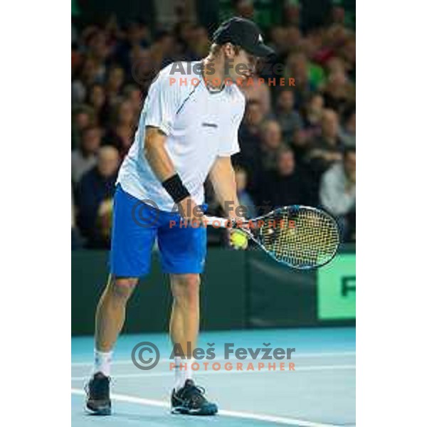 Grega Zemlja of Slovenia in action during Davis Cup match between Slovenia and Lithuania in Kranj, Slovenia on October 30, 2015.