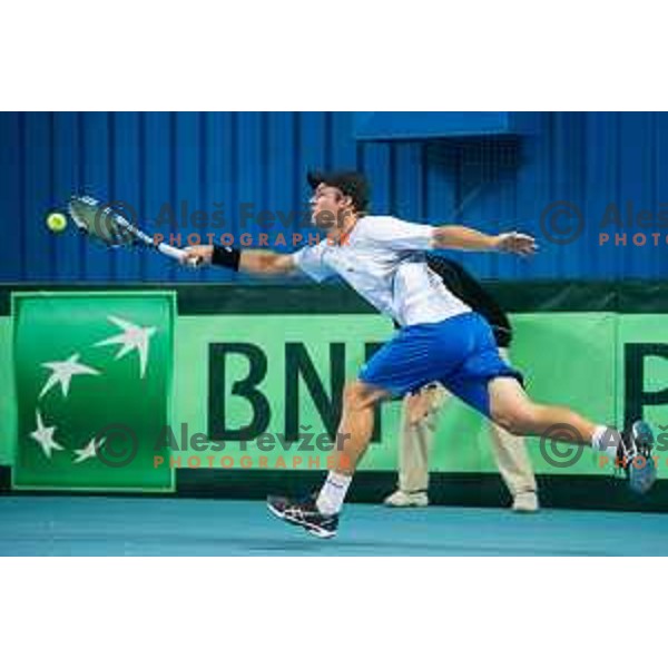Grega Zemlja of Slovenia in action during Davis Cup match between Slovenia and Lithuania in Kranj, Slovenia on October 30, 2015.