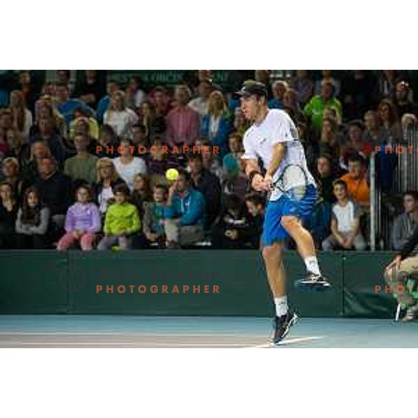 Grega Zemlja of Slovenia in action during Davis Cup match between Slovenia and Lithuania in Kranj, Slovenia on October 30, 2015.