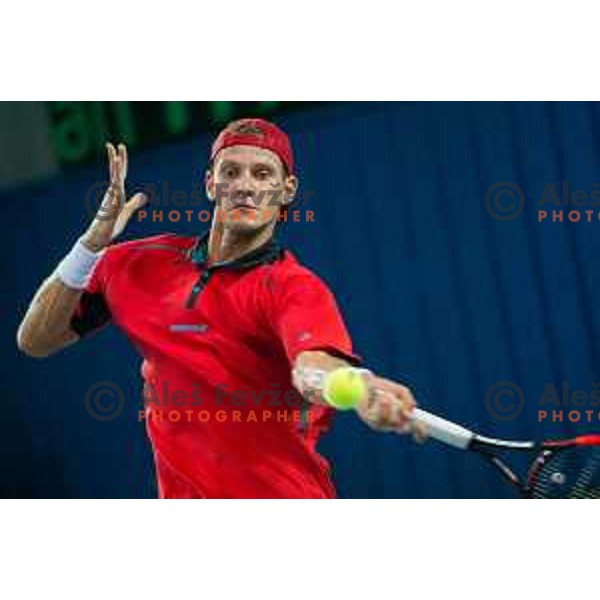 Blaz Rola of Slovenia in action during Davis Cup match between Slovenia and Lithuania in Kranj, Slovenia on October 30, 2015.
