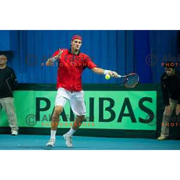 Blaz Rola of Slovenia in action during Davis Cup match between Slovenia and Lithuania in Kranj, Slovenia on October 30, 2015.