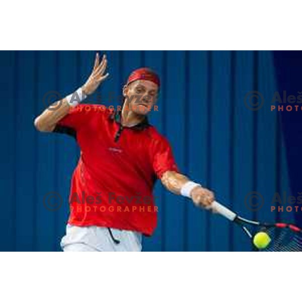 Blaz Rola of Slovenia in action during Davis Cup match between Slovenia and Lithuania in Kranj, Slovenia on October 30, 2015.