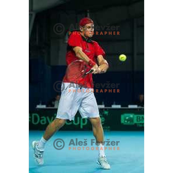 Blaz Rola of Slovenia in action during Davis Cup match between Slovenia and Lithuania in Kranj, Slovenia on October 30, 2015