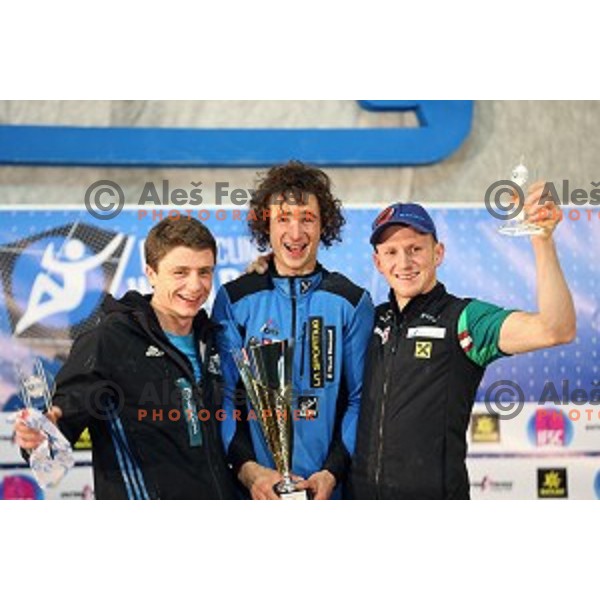 Gautier Supper (FRA), Adam Ondra (CZE) and Jakob Schubert of Austria in the Final of IFSC Climbing World Cup 2015 in Zlato pole Hall, Kranj, Slovenia in November 15, 2015