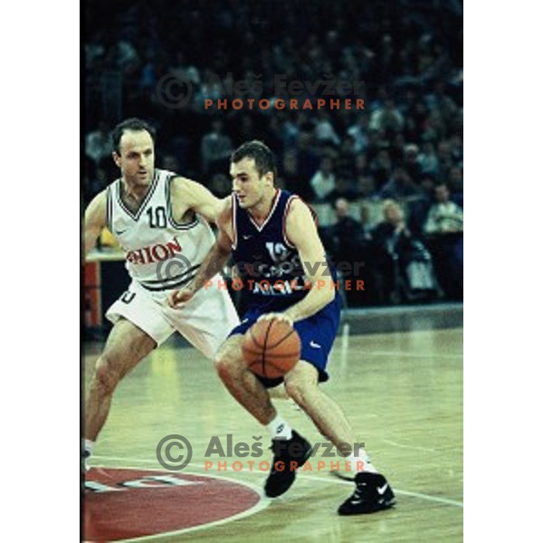 Dusan Hauptman of Union Olimpija and Slaven Rimac in action during basketball match Smelt Olimpija- Cibona in Tivoli Hall, Ljubljana, Slovenia on March 11, 1997