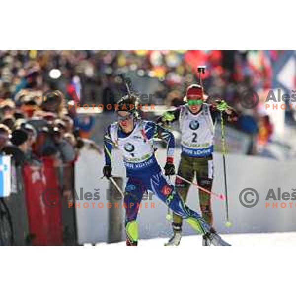 Laura Dahlmeier and Marie Dorin Herbert during BMW IBU World Cup Biathlon Women Pursuit 10km at Pokljuka, Slovenia on December 19, 2015